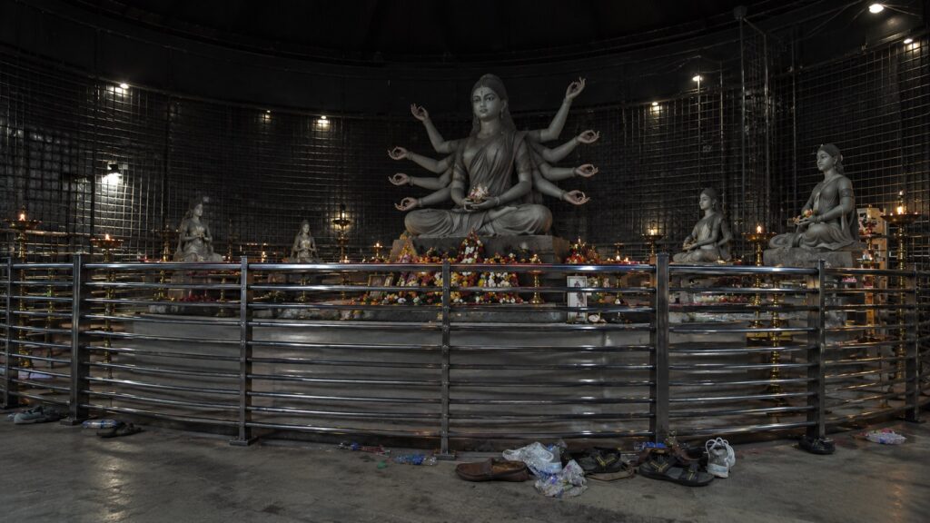 Dimly-Lit-Multi-Armed-Goddess-Shrine.jpg