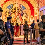 Guarding-the-Durga-Puja-Entrance.jpg